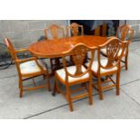Yew wood extending table and 6 chairs good condition measures approx when shut 60 inches long, 36