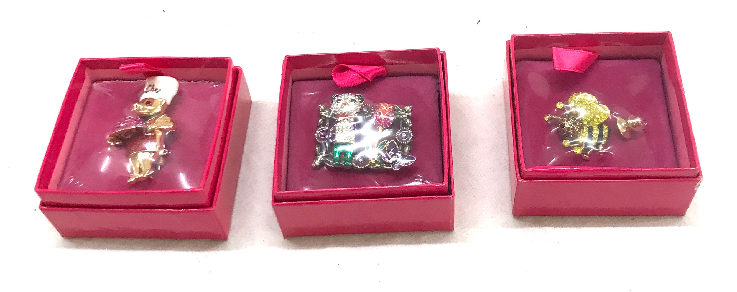 Three Brand new in boxes Butler and Wilson Brooches includes Panda, pig and bee