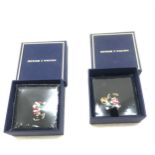 2 Brand new in the Packaging Butler and Wilson Santa Skating Pin badge