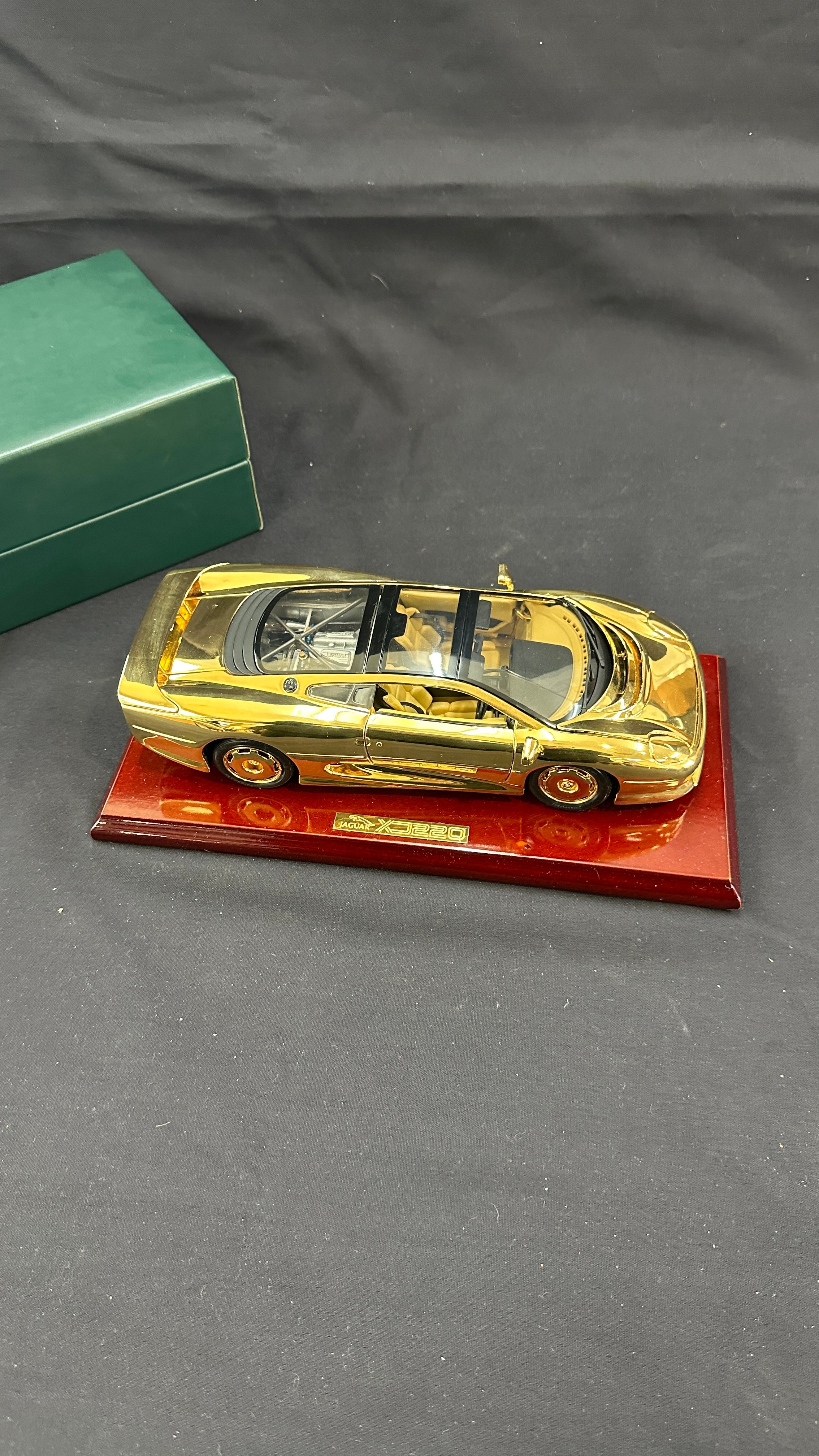 Boxed Jaguar XJ220 a 22 carat gold plate limited edition model car on stand, overall length of car - Image 2 of 4