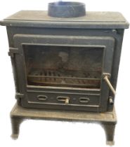 Vintage Firefox cast iron log burner measures approx 26 inches tall by 21 wide