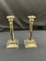 Pair of silver plated candle sticks height 11 inches