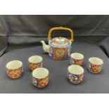 Oriental tea pot and 6 cups