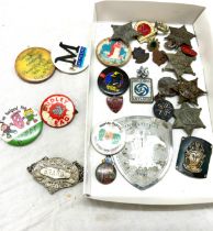 Selection of vintage badges