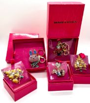 Selection 5 boxed as new vintage Butler and Wilson keyrings and brooches to include a bunny, teddy