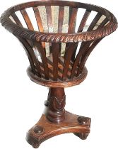 Reproduction mahogany plant stand measures approx 27 inches tall by 19.5 diameter