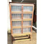 Antique oak glazed bookcase with bobbin legs measures approx 65 inches tall,35 wide and 10 deep