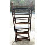 Vintage mahogany bookcase measures approx 60 inches tall by 23 wide and 10.5 deep