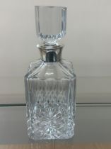 Silver topped decanter