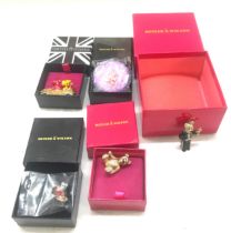 5 Boxed Butler and Wilson brooches/ compact