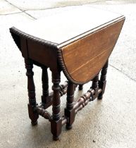 Period gate leg table with pie crust edge measures approx 26 inches tall by 26 inches wide and 13