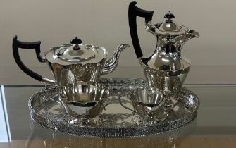 Four piece plate tea set on gallery tray