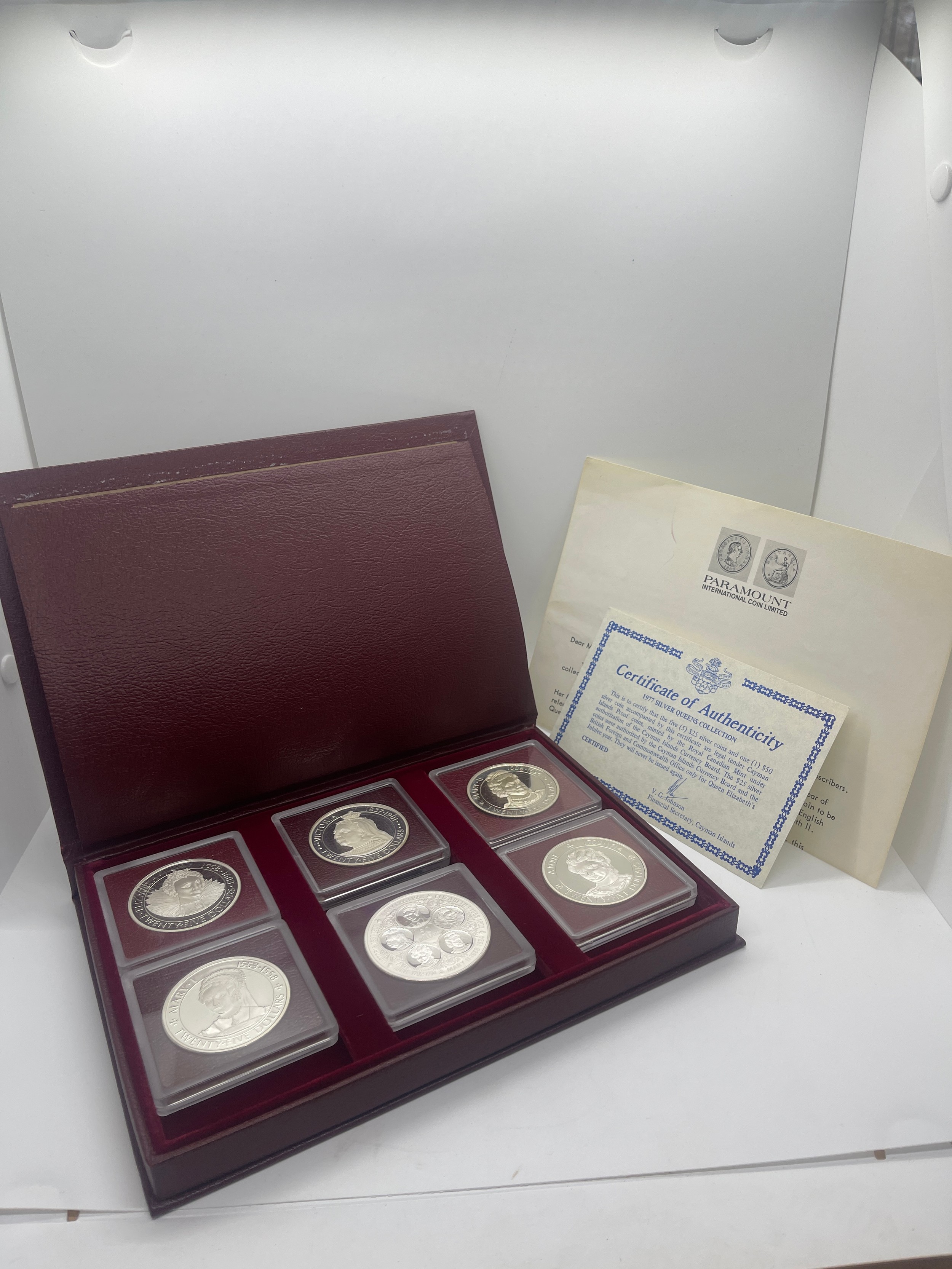 Boxed the Cayman island silver queens collection 1977 coin set with COA