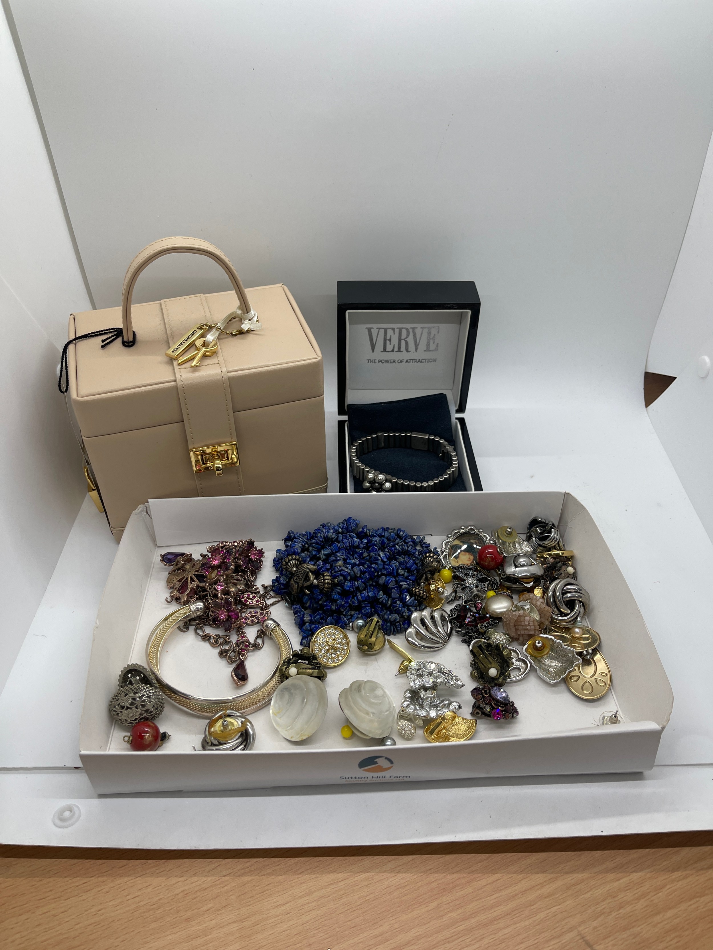 Tray of costume jewellery includes Earrings, Verve bracelet, perfume bottle etc