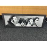 Framed Beatles print measures 36 inches by 16 inches