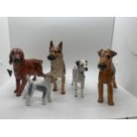 4 Royal Doulton dog figures includes Dalmatian, German Sheppard etc