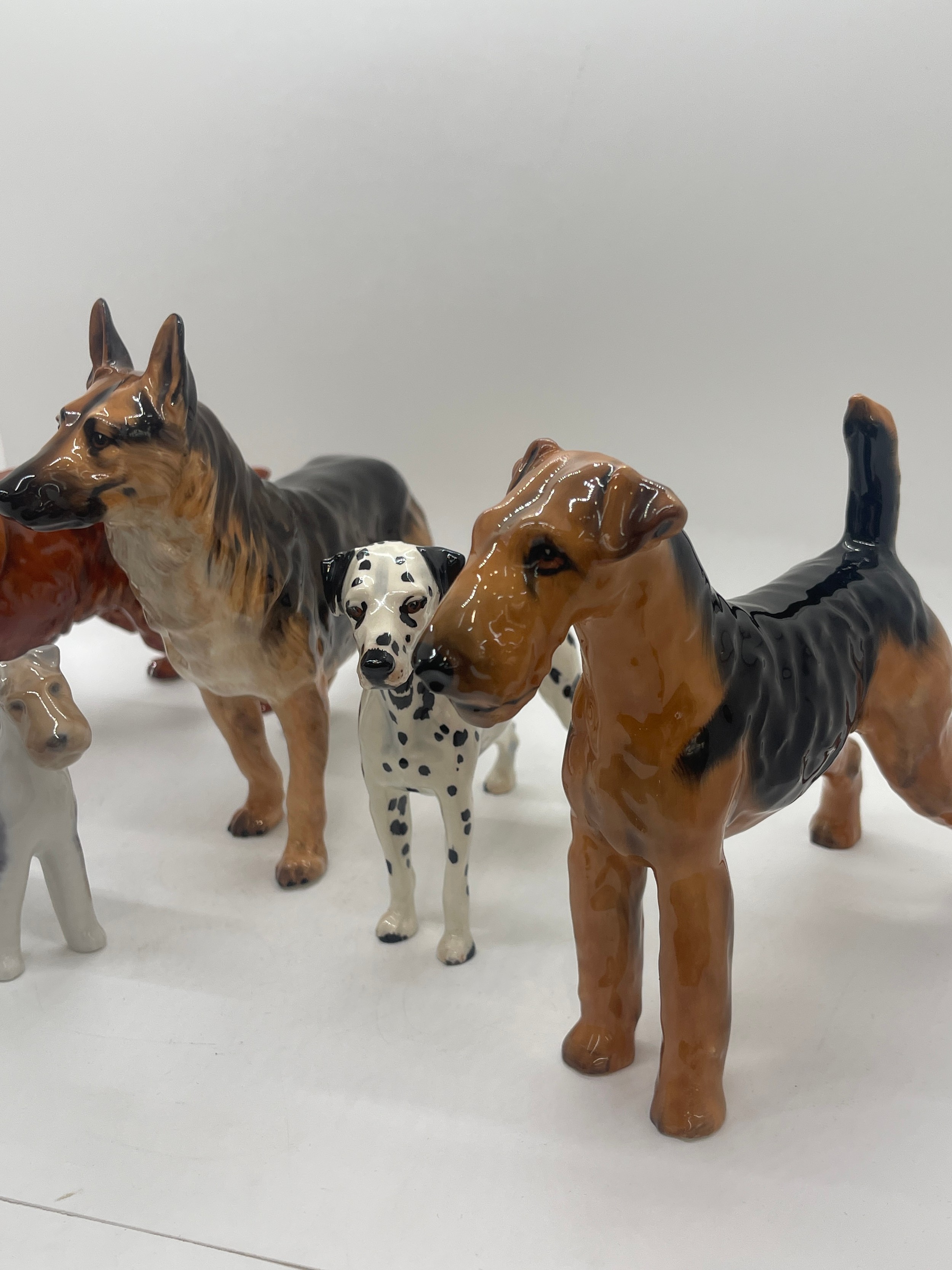 4 Royal Doulton dog figures includes Dalmatian, German Sheppard etc - Image 2 of 5