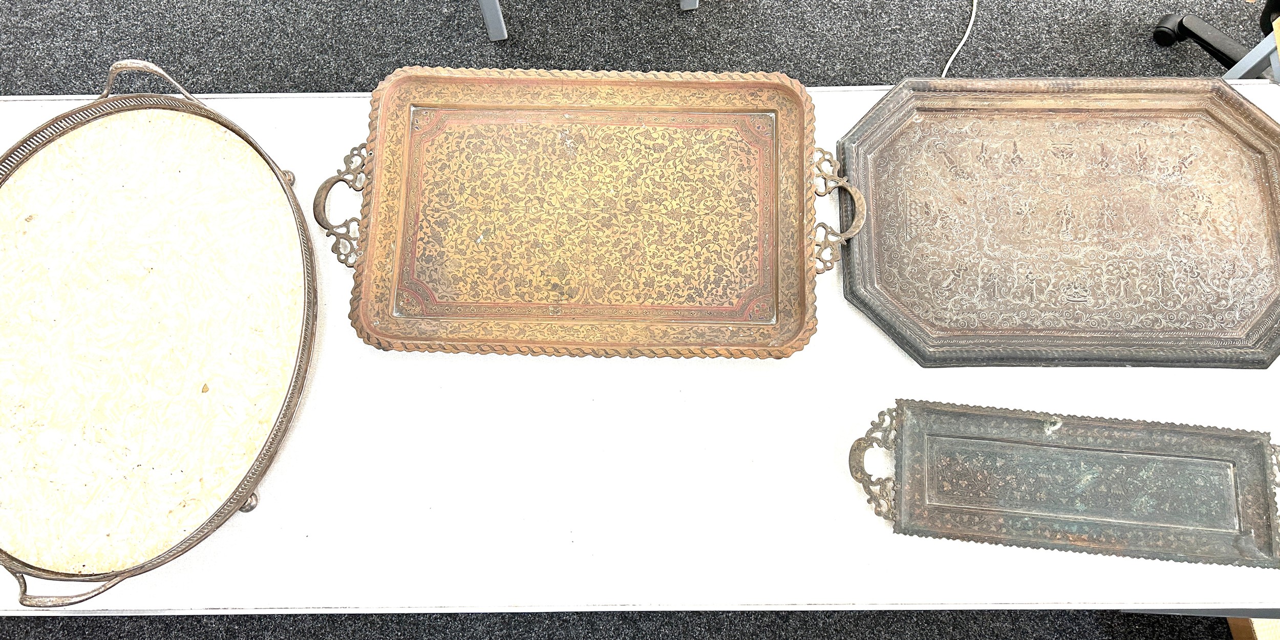 3 Antique Indian finely chased serving/ tea trays and a large vintage serving tray with silver