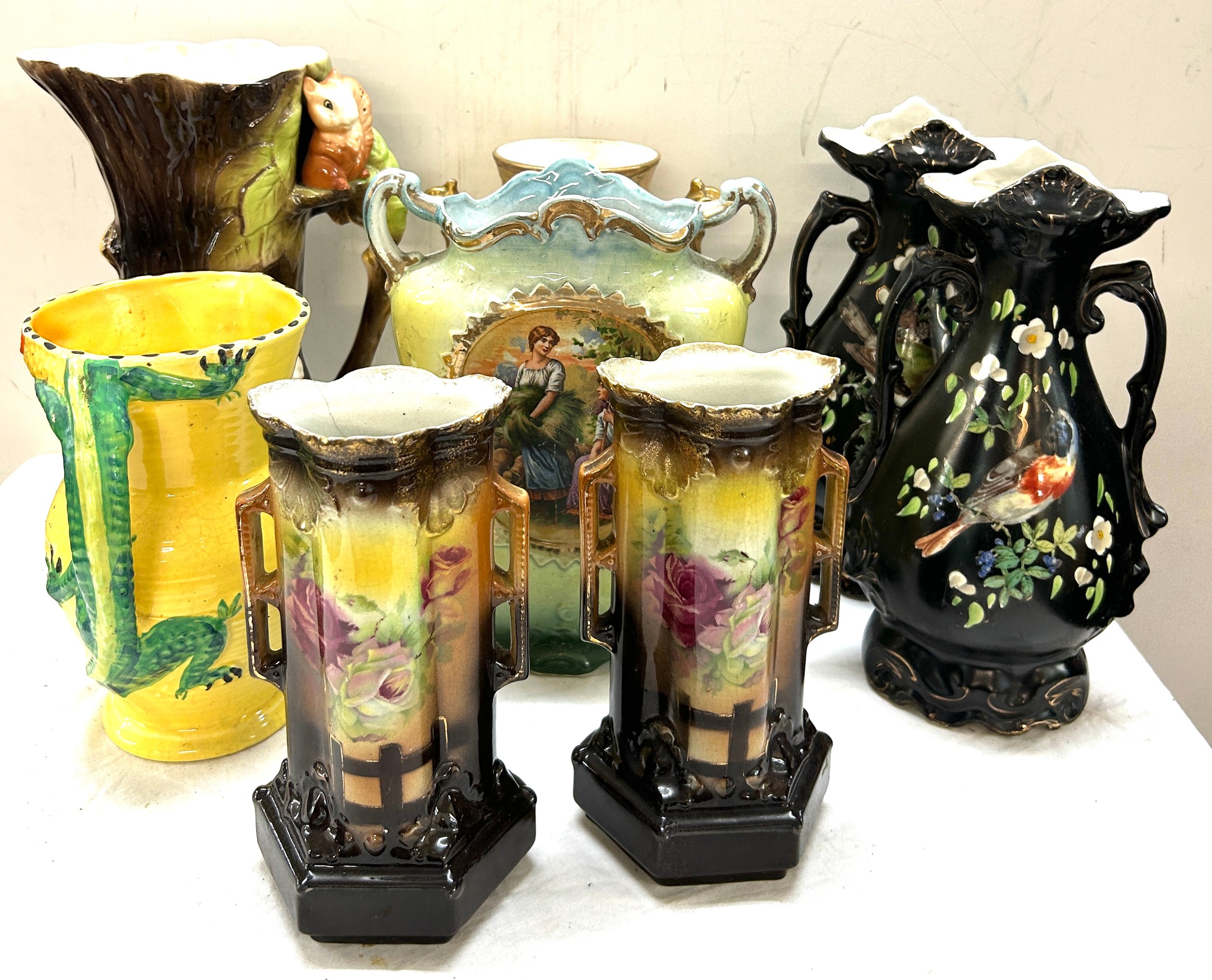 Large selection of jugs and vases to include porcelain tallest measures 11 inches tall