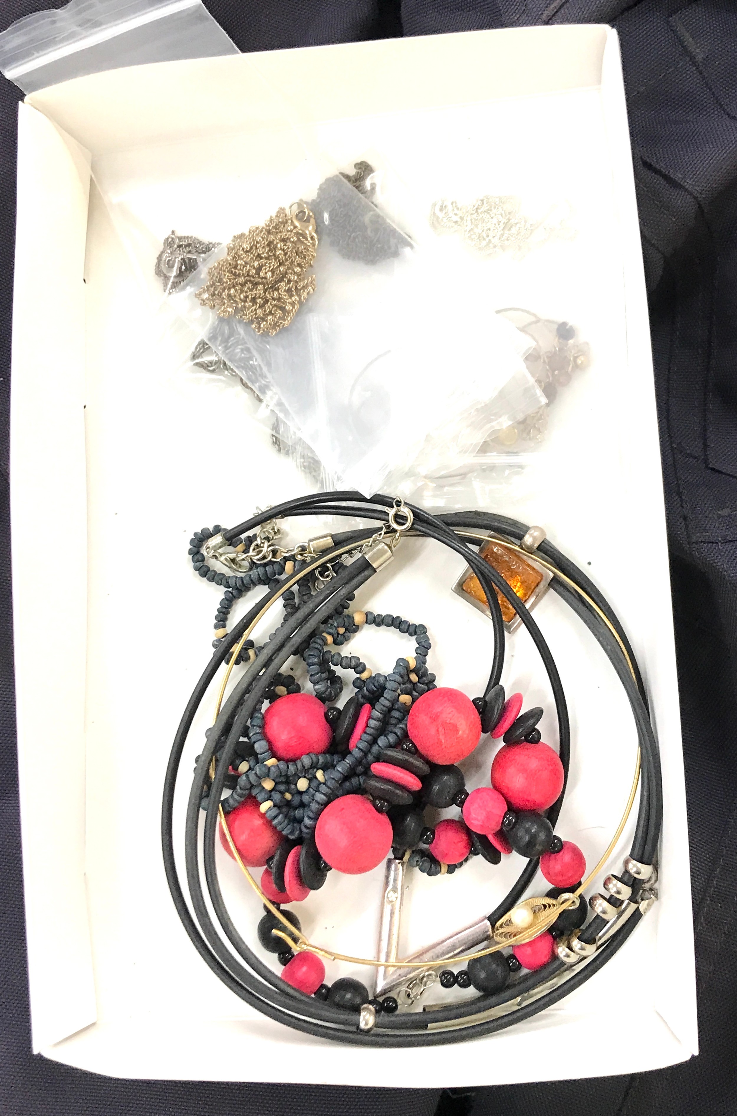 Selection of costume jewellery includes necklaces, silver etc