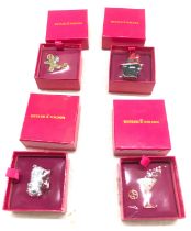 Four brand new in box Butler and Wilson Brooches includes Pig, Ginger bread etc