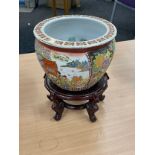 Japanese hand painted jardiniere on a wooden stand 6 inches tall 8 inches diameter and a Hand