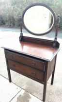 Two drawer oak dressing chest with mirror measures approx 59 inches tall, 36 wide and 20 deep