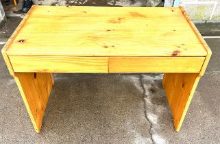 Two drawer pine desk measures approx 28 inches tall, 41 wide and 23 deep