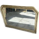 Gilt framed over mantel mirror measures approx 29 inches tall by 40.5 wide