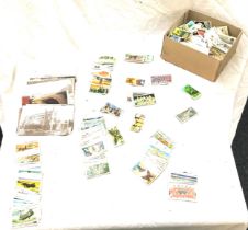 Selection of assorted post cards and cigarette cards