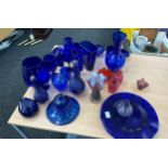 Selection of blue colour's glassware includes vases, plates etc