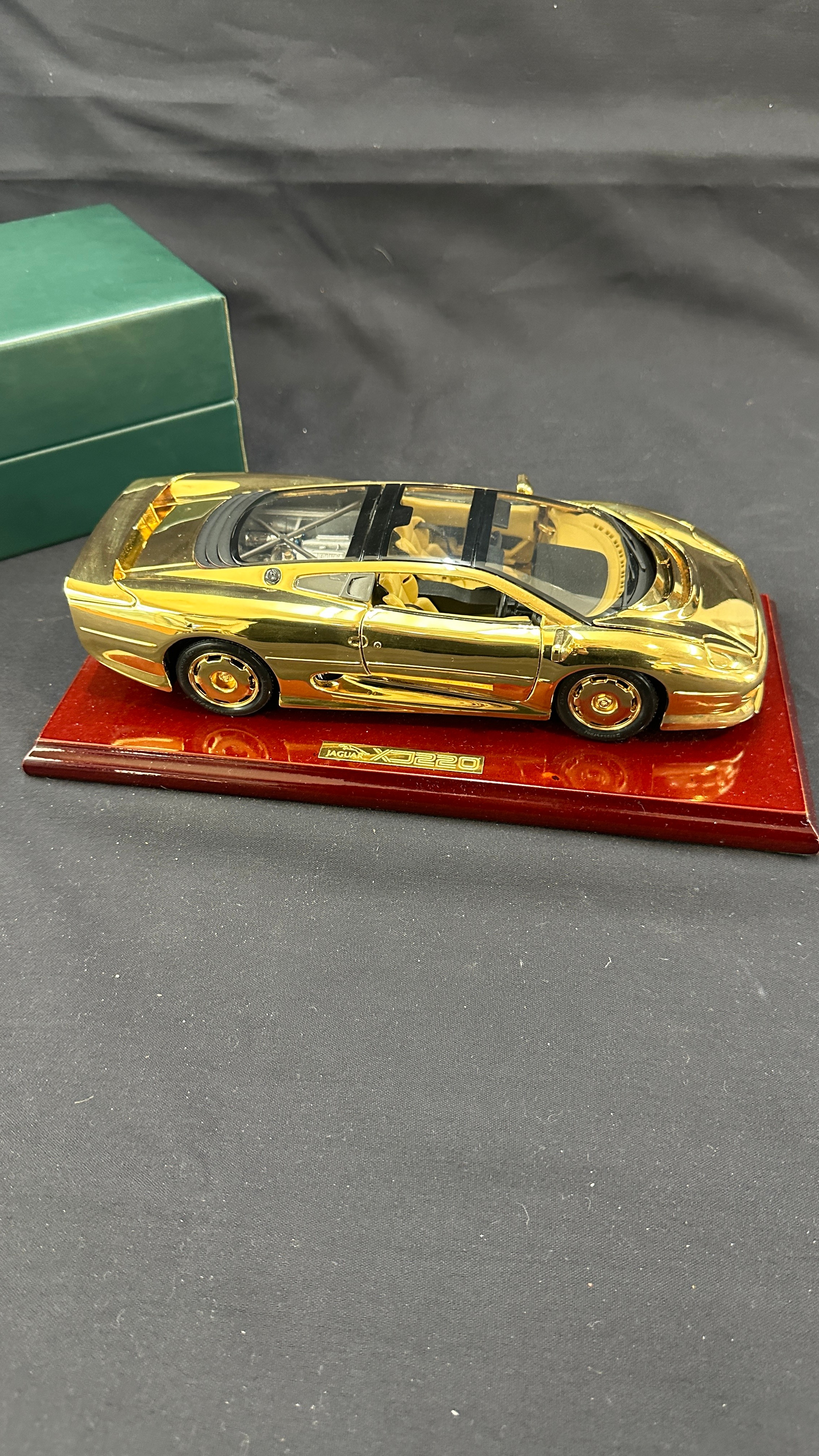 Boxed Jaguar XJ220 a 22 carat gold plate limited edition model car on stand, overall length of car - Image 3 of 4
