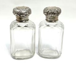 Pair of antique silver top scent bottles each measure approx 9cm hight in good condition london