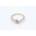 9ct gold diamond solitaire ring in a four claw setting (2.7g)