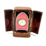 An extremely fine miniature silver and pink guilloche enamel carriage or travel clock in its