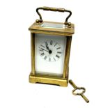 Vintage brass carriage clock the clock winds and ticks measures approx height without handle 11cm