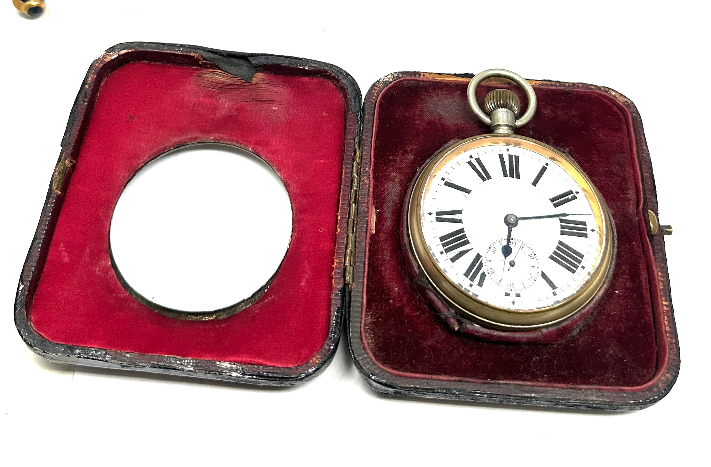 Antique Goliath open face pocket watch with silver travel case the watch is ticking the watch