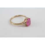 9ct gold oval cut glass filled ruby & baguette cut diamond dress ring (3.5g)