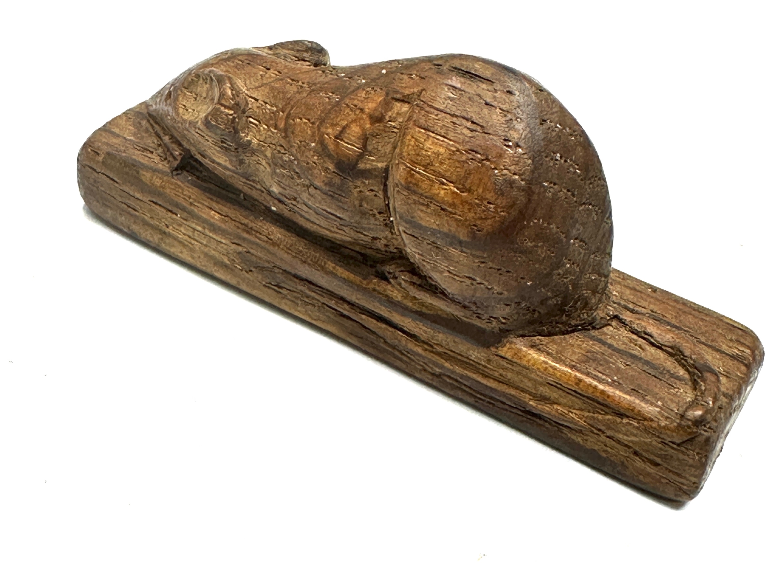 Robert Thompson of Kilburn (1876-1955) Mouseman- a small carved oak signature mouse, 5.8cm long