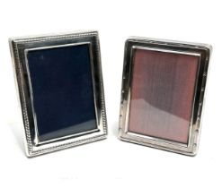 2 picture frames largest measures approx 10.5cm by 8cm hallmarked silver the other is silver plated