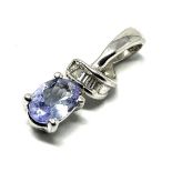 9ct white gold topaz & diamond pendant