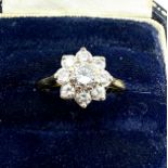 18ct gold diamond cluster ring est approx .90 of diamonds central diamond measures 5mm dia weight
