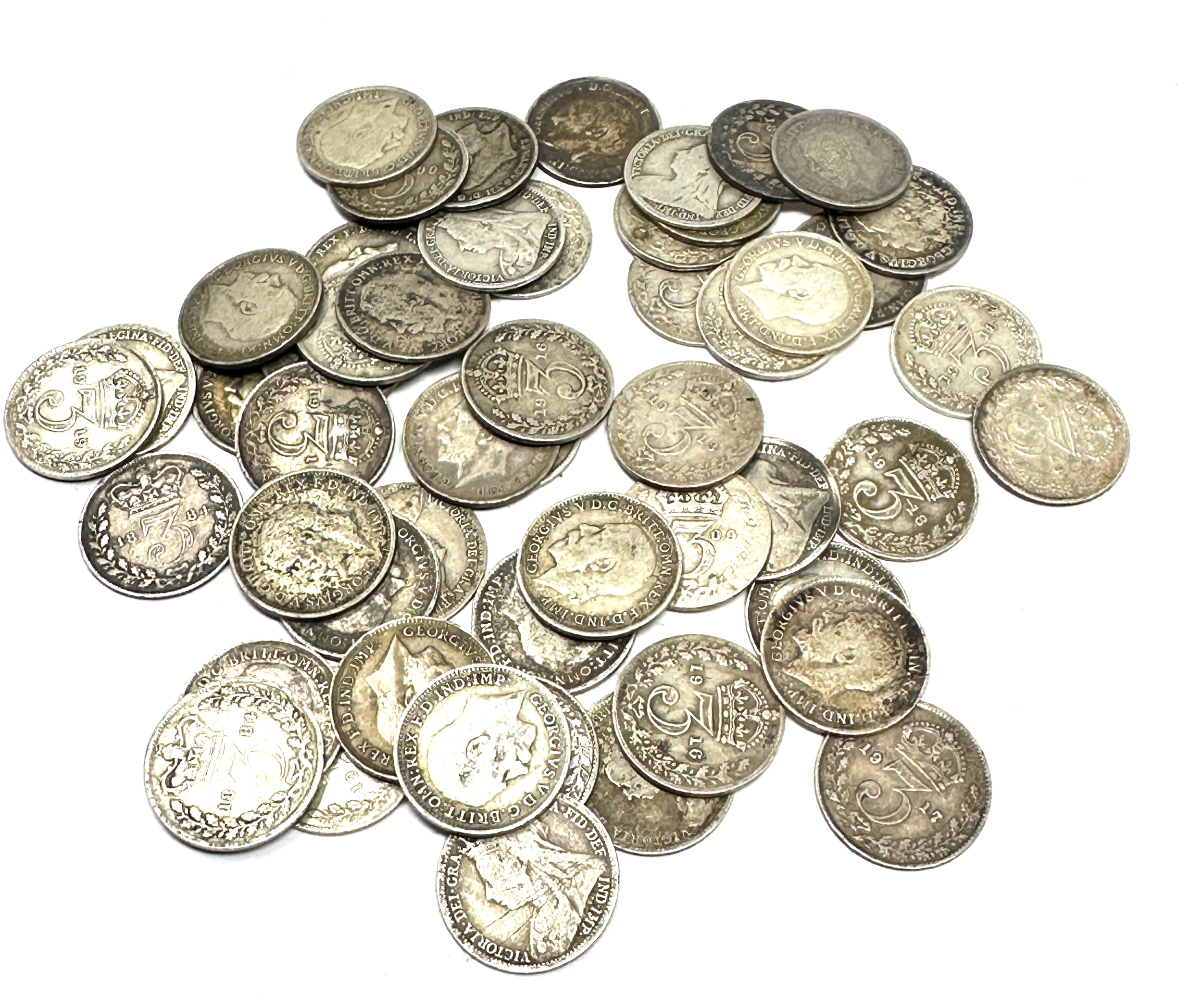 selection of pre 1920 silver three pence coins