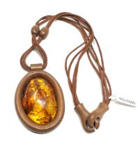 Large amber pendant on leather necklace