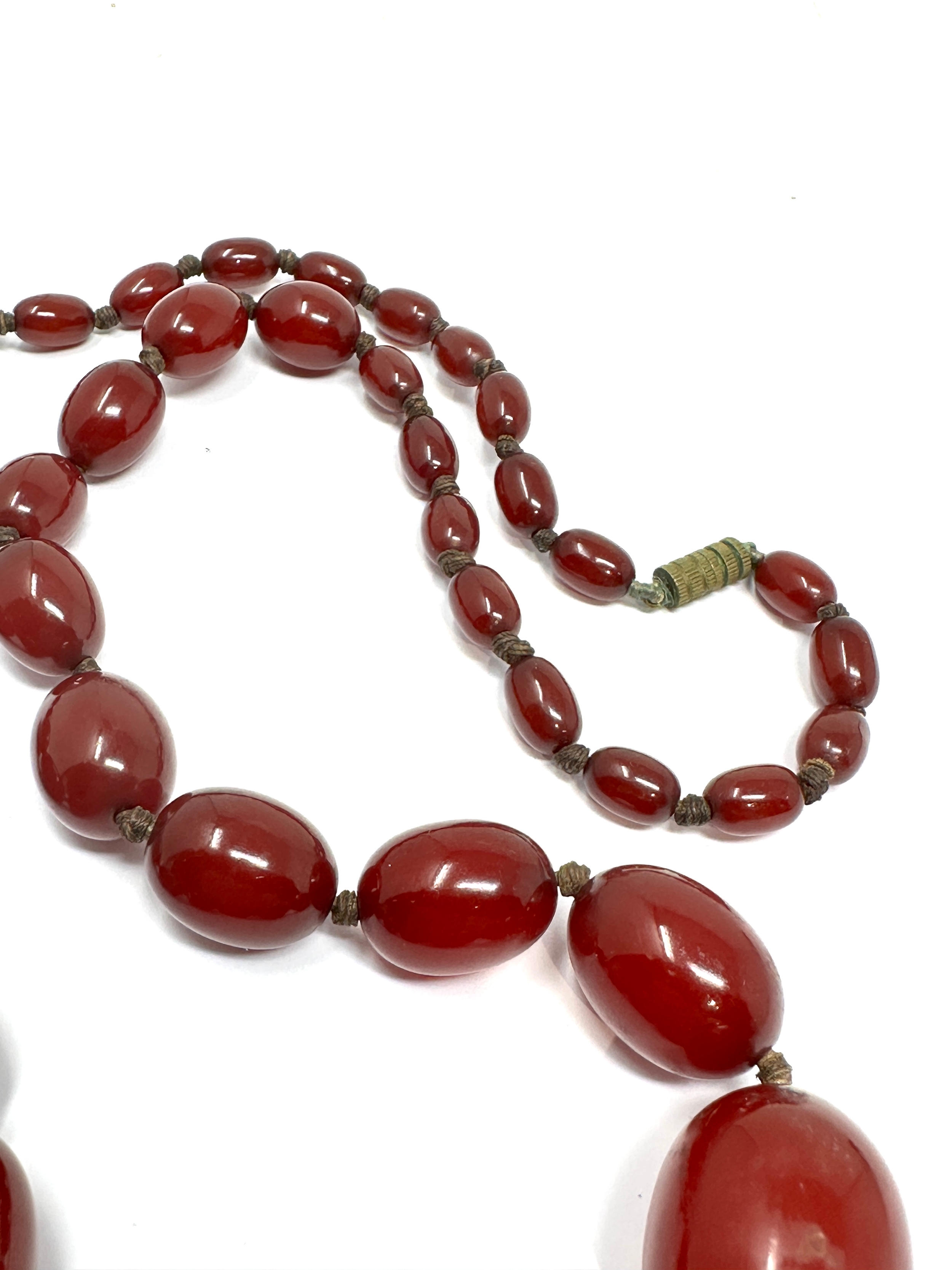 Antique / vintage cherry bakelite graduated bead necklace largest bead measures approx 30mm by - Image 4 of 4