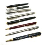 selection of fountain pens and pencils