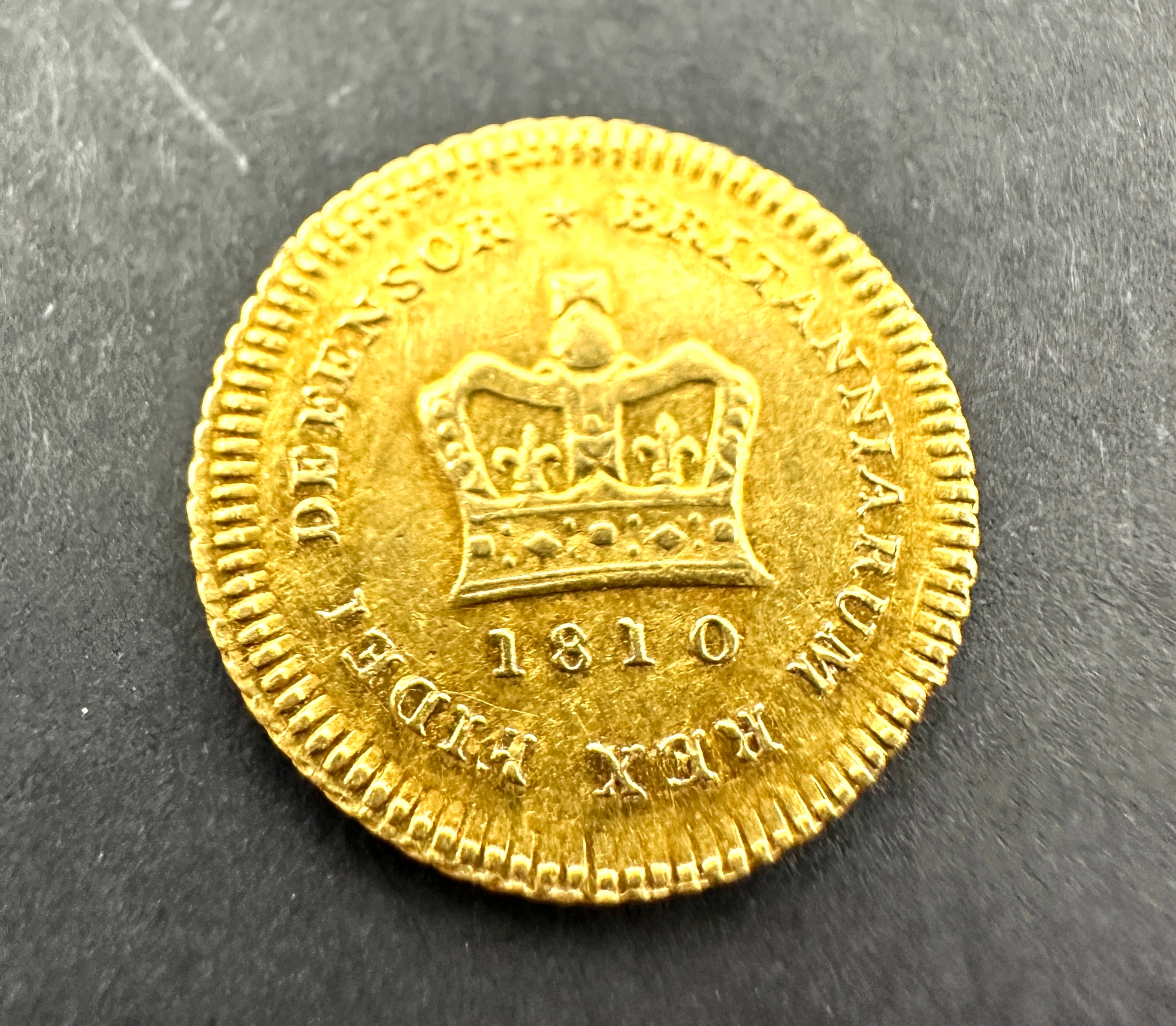 A rare, collectable gold Third-Guinea of King George III, dated 1810. The obverse features the fifth - Image 2 of 2