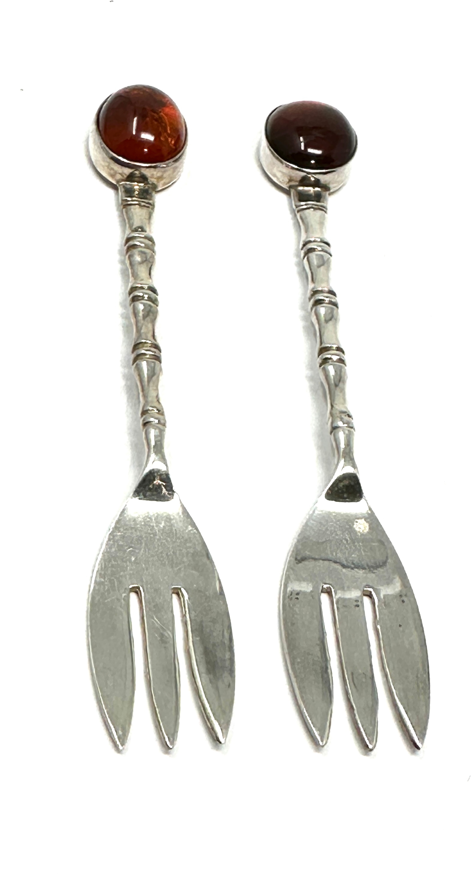2 silver & amber pickle forks