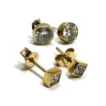 2 pairs of 9ct gold & white stone earrings weight 1.8g