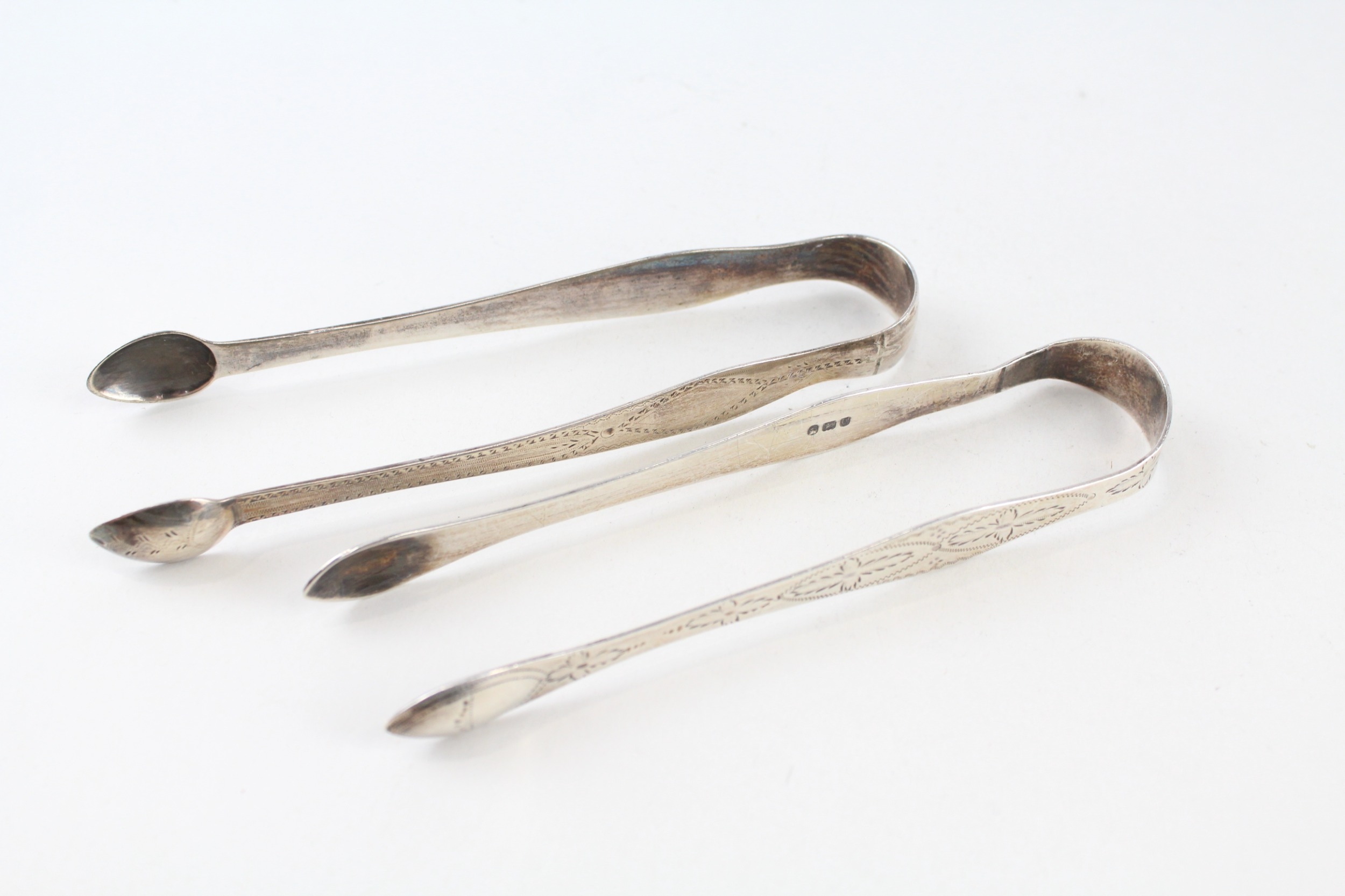 2 x georgian .925 sterling sugar tongs